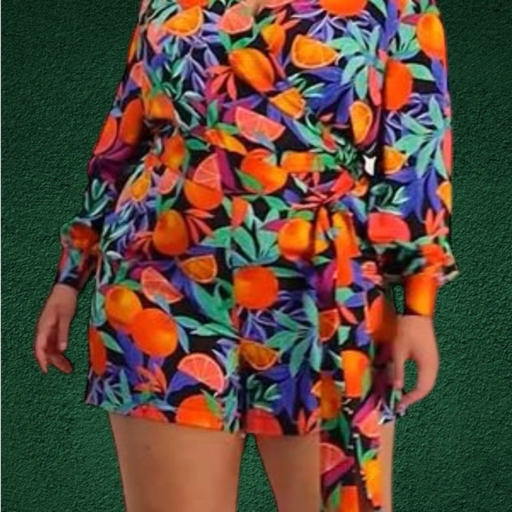 Vibrant Orange and Blue Jumpsuit with Bold Tropical Print